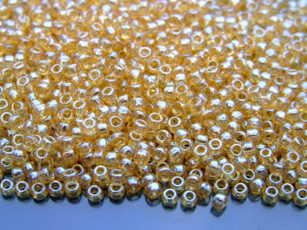 TOHO Seed Beads 103 Transparent Light Topaz Luster 8/0 beads mouse