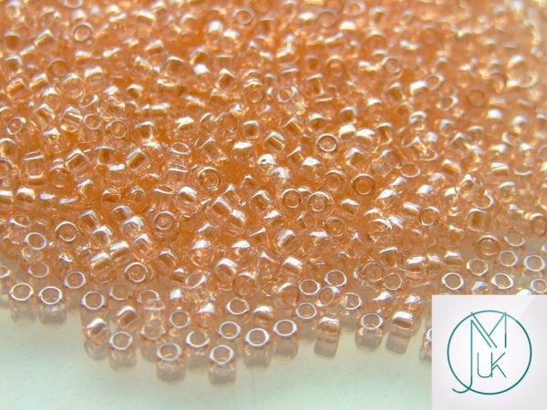 TOHO Seed Beads 106 Transparent Rosaline Luster 8/0 beads mouse