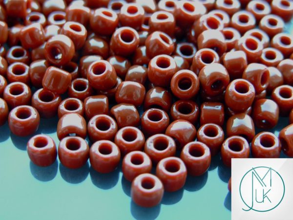TOHO Seed Beads 46L Opaque Terra Cotta 3/0 beads mouse