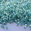 TOHO Seed Beads 995F Gold Lined Frosted Aqua 11/0 beads mouse