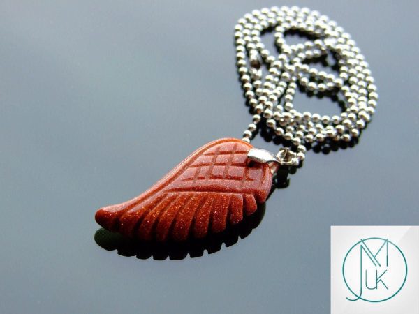 Goldstone Manmade Gemstone Angel Wing Pendant mine to mind