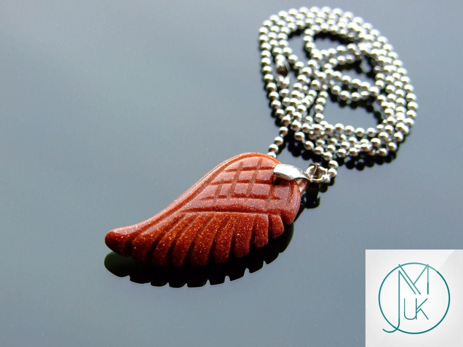 Goldstone Manmade Gemstone Angel Wing Pendant mine to mind