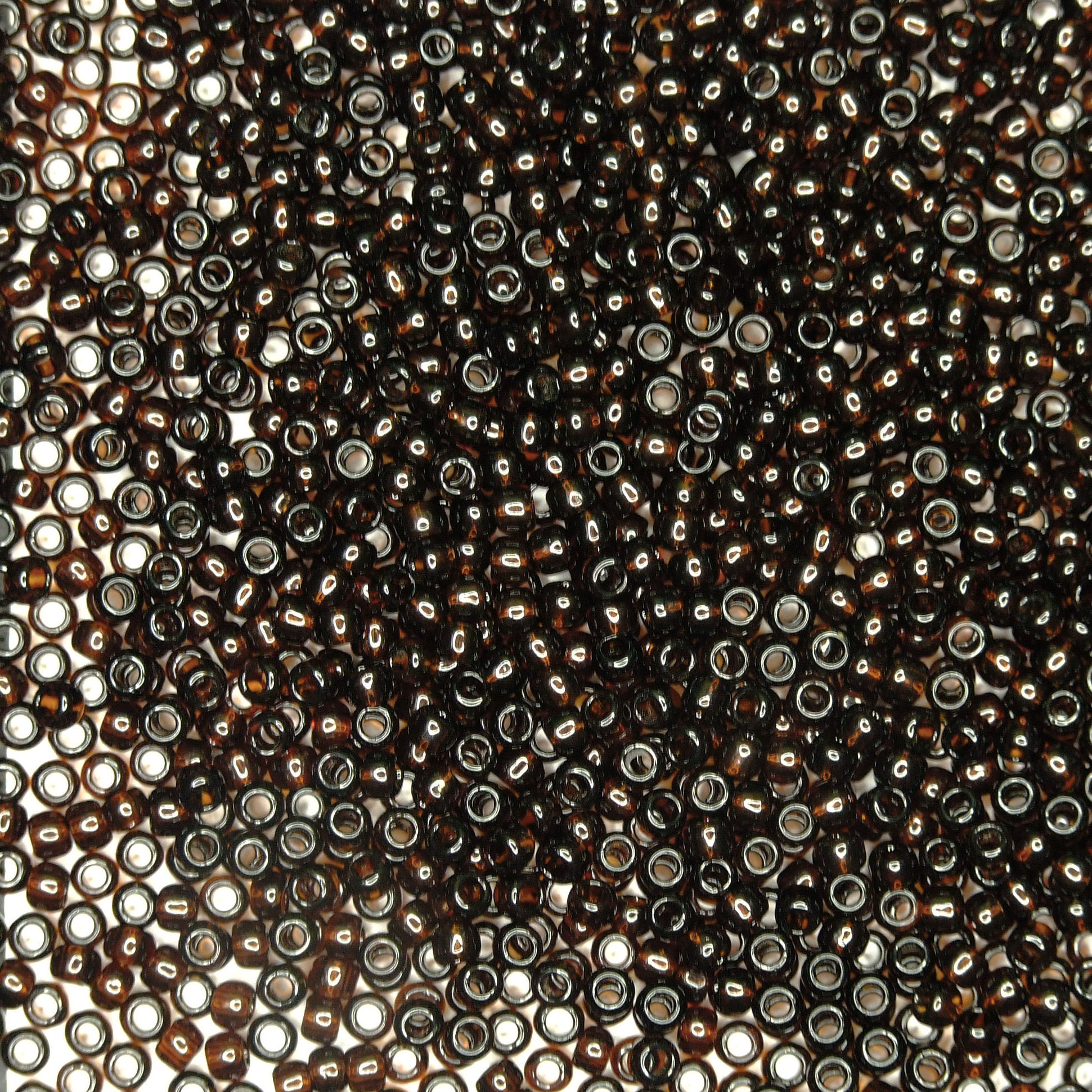 TOHO Seed Beads 14 Transparent Root Beer beads mouse