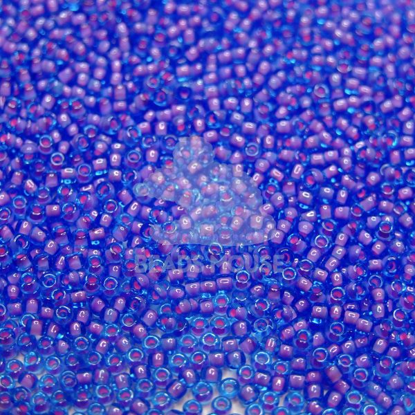 TOHO Seed Beads 938 Inside Color Aqua Pink Lined beads mouse white backround