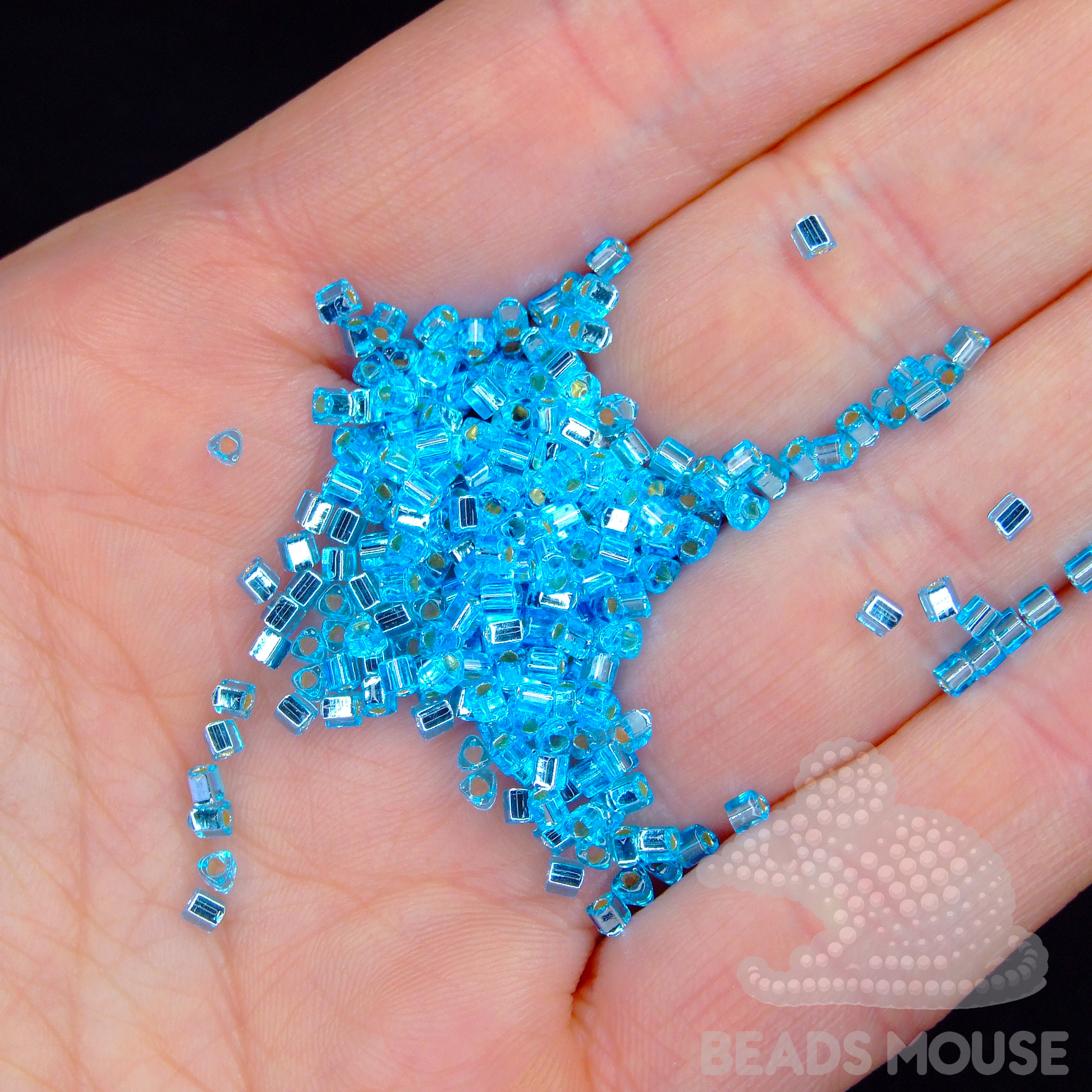 TOHO Triangle Beads 23 Silver Lined Aquamarine beadsmouse.co.uk