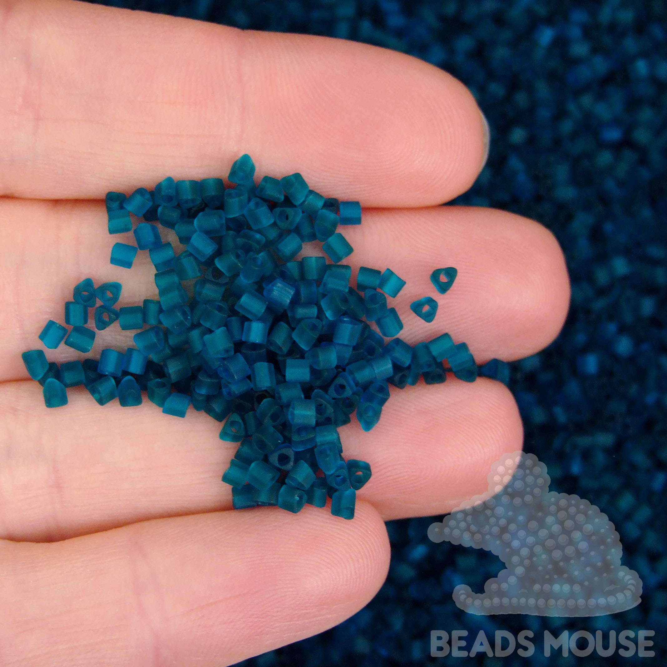 TOHO Triangle Beads 7BDF Transparent Frosted Teal beadsmouse.co.uk