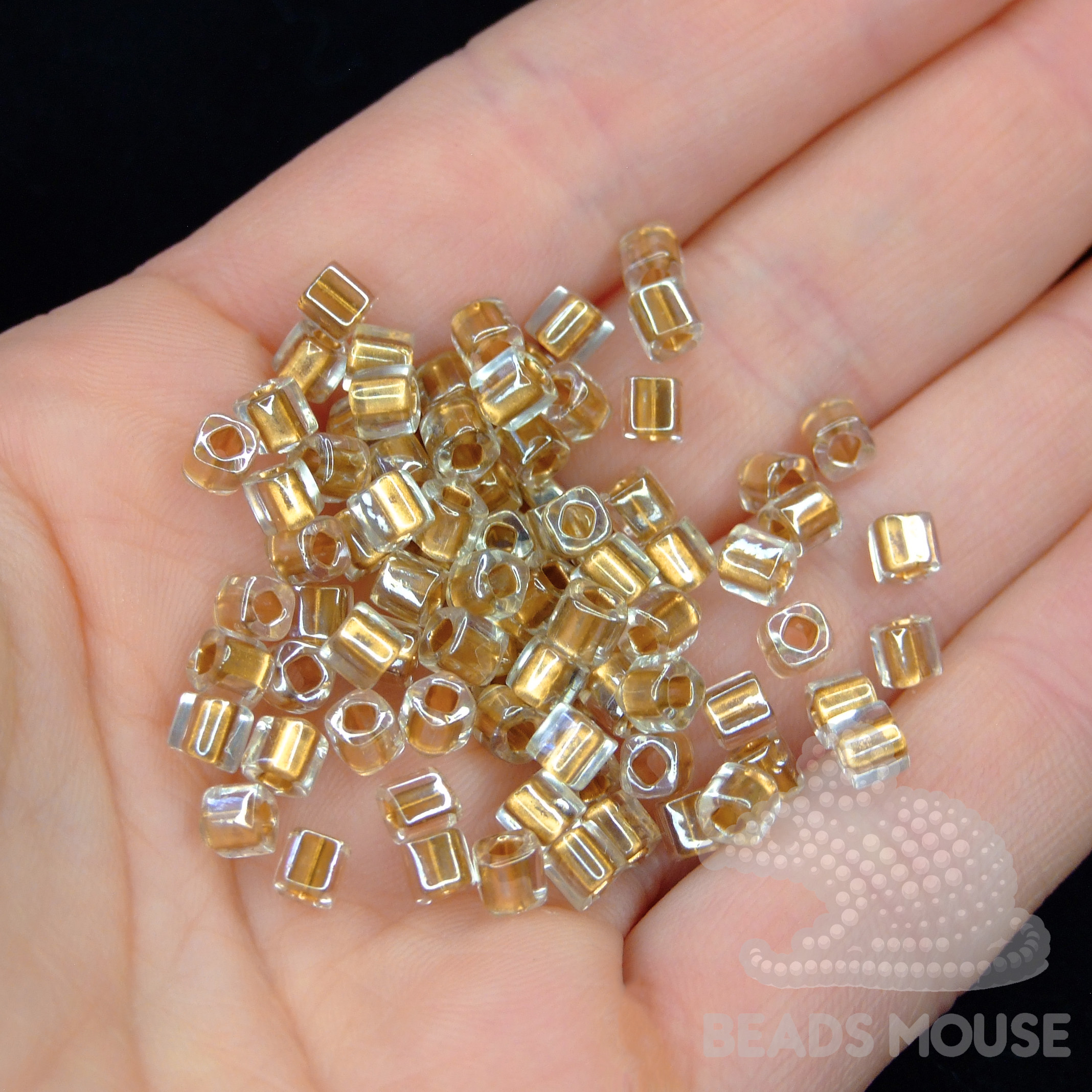 TOHO Cube Beads 989 Golden Lined Crystal 4mm beadsmouse.co.uk