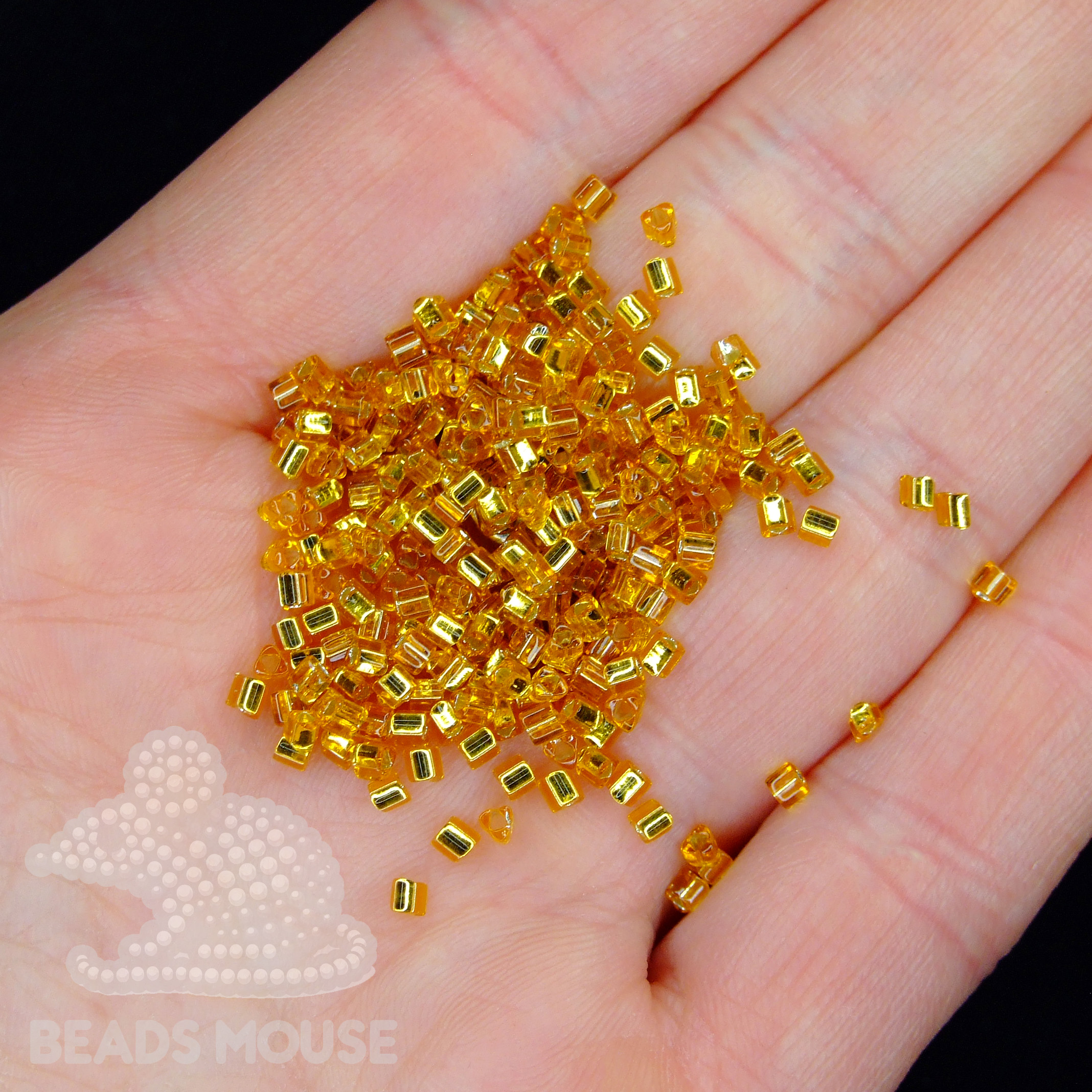TOHO Triangle Beads 22C Silver Lined Topaz beadsmouse.co.uk